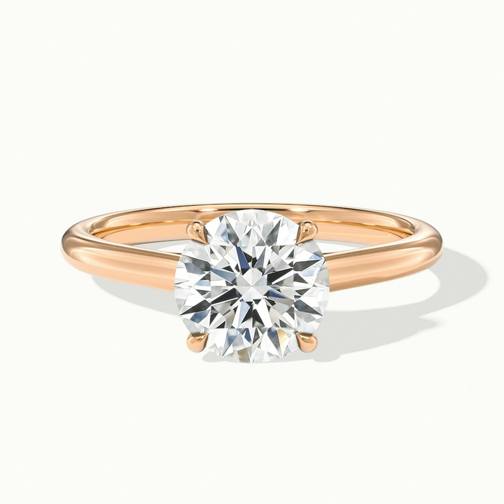 Zara 1 Carat Round Solitaire Moissanite Engagement Ring in 10k Rose Gold