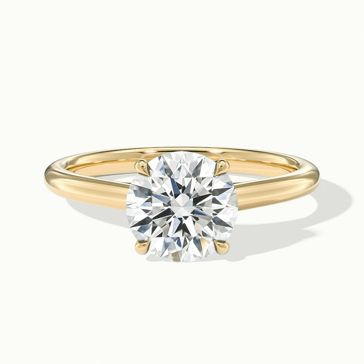Zara 1.5 Carat Round Solitaire Moissanite Engagement Ring in 18k Yellow Gold