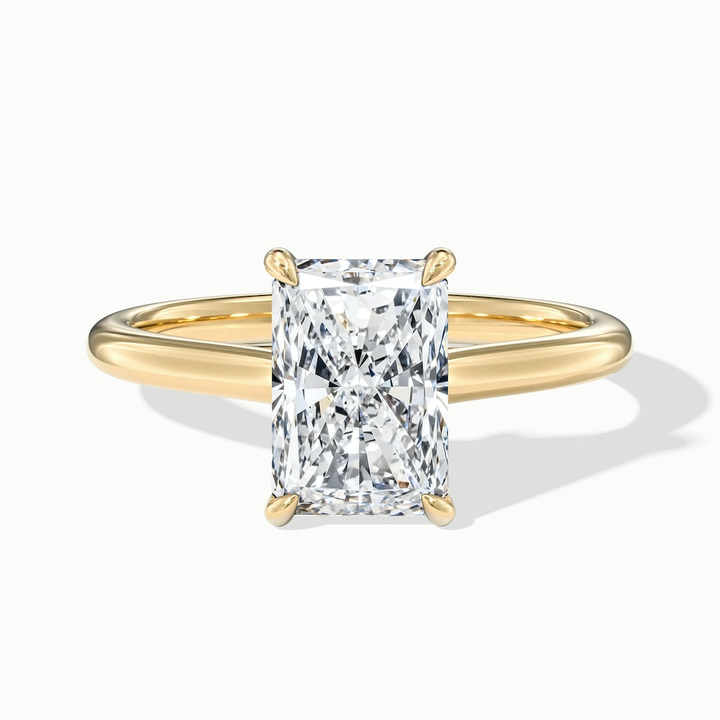 Adel 7 Carat Radiant Cut Solitaire Moissanite Engagement Ring in 18k Yellow Gold