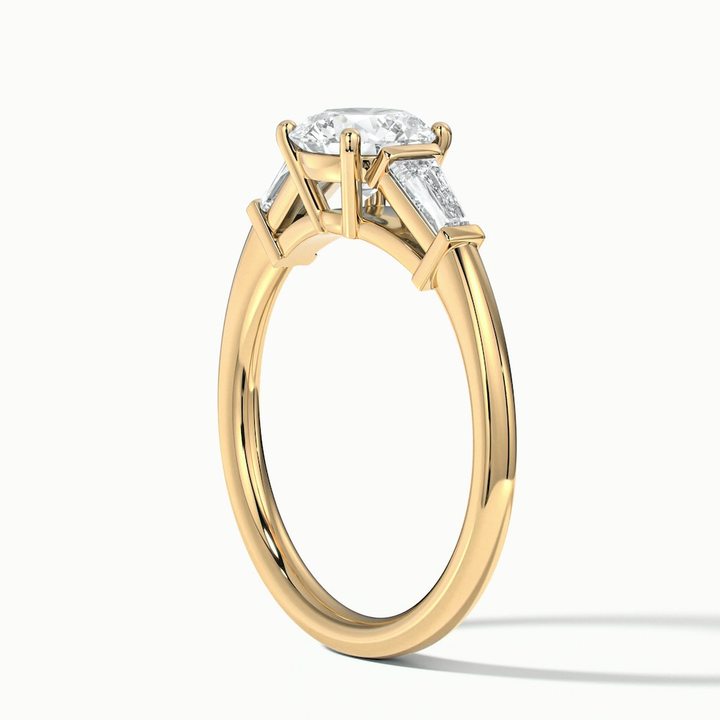 Kia 9 Carat Round 3 Stone Moissanite Diamond Ring With Side Baguette Diamonds in 14k Yellow Gold