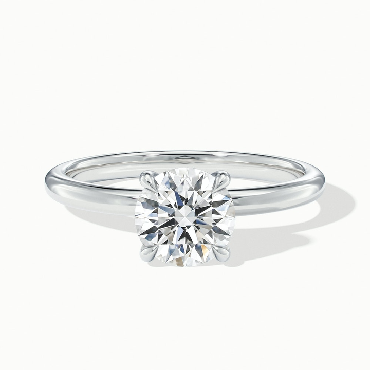 Jany 1.5 Carat Round Cut Solitaire Moissanite Diamond Ring in Platinum