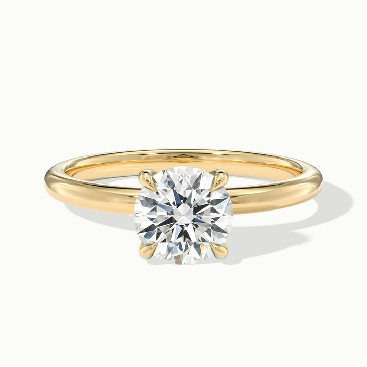 Jany 1.5 Carat Round Cut Solitaire Moissanite Diamond Ring in 14k Yellow Gold