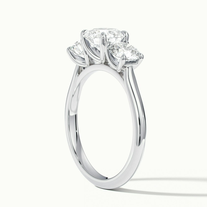 Iris 1 Carat Round Three Stone Moissanite Diamond Ring in Platinum