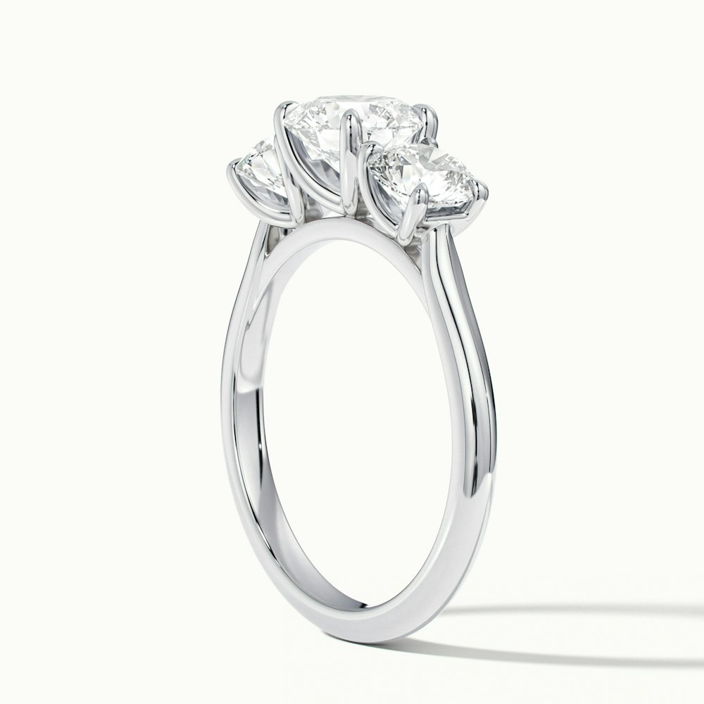 Iara 1.5 Carat Round Three Stone Lab Grown Engagement Ring in Platinum