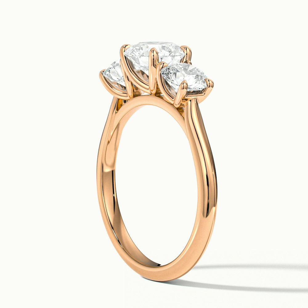 Iris 1.5 Carat Round Three Stone Moissanite Diamond Ring in 10k Rose Gold