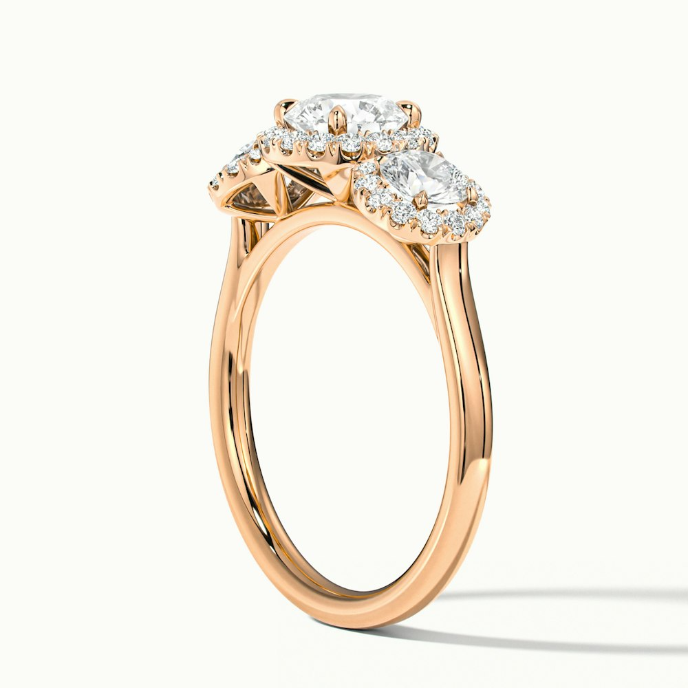 Emma 1.5 Carat Three Stone Round Halo Moissanite Engagement Ring in 10k Rose Gold