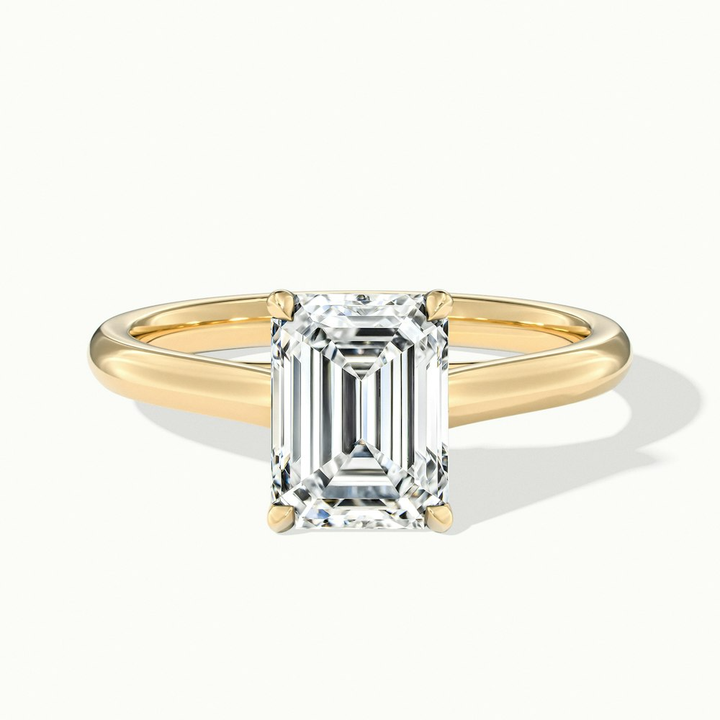Ira 3 Carat Emerald Cut Solitaire Moissanite Engagement Ring in 14k Yellow Gold