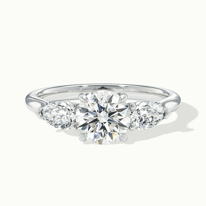 Amaya 2.5 Carat Round 3 Stone Moissanite Diamond Ring With Pear Side Stone in 10k White Gold