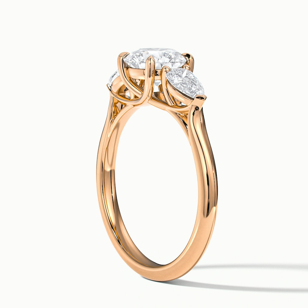 Amaya 4 Carat Round 3 Stone Moissanite Diamond Ring With Pear Side Stone in 18k Rose Gold