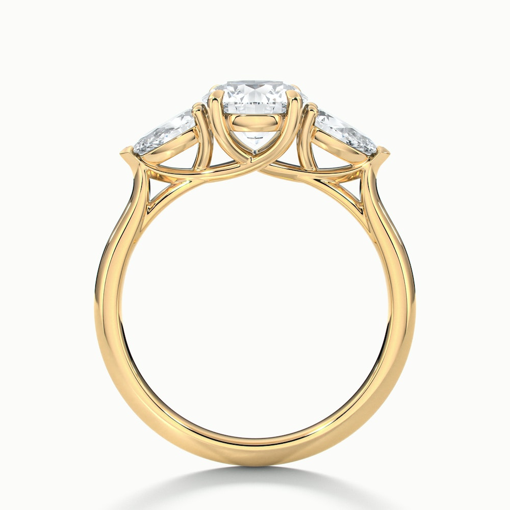 Amaya 1.5 Carat Round 3 Stone Moissanite Diamond Ring With Pear Side Stone in 10k Yellow Gold