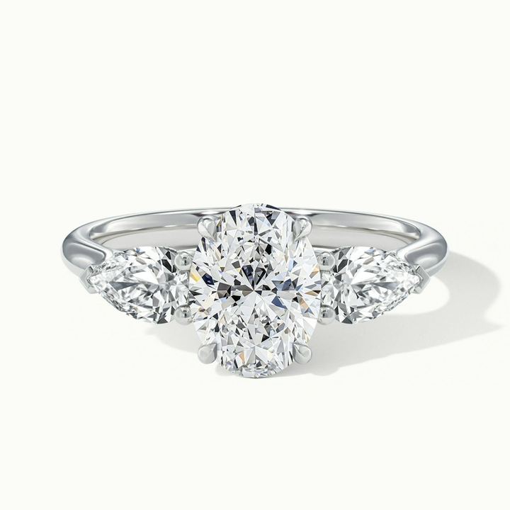 Ceci 10 Carat Three Stone Oval Halo Moissanite Engagement Ring in 18k White Gold