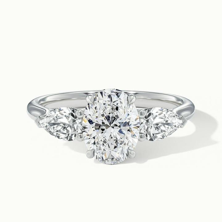 Isa 1.5 Carat Three Stone Oval Halo Moissanite Engagement Ring in 18k White Gold