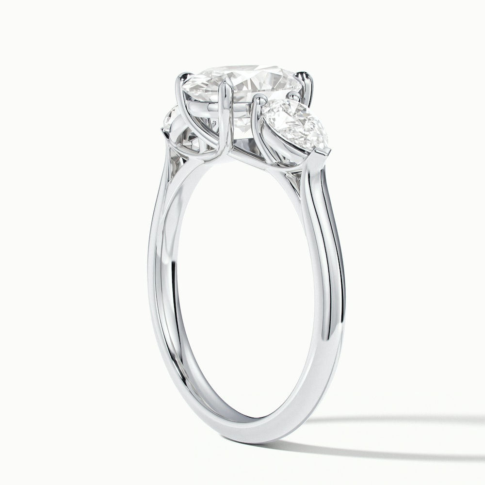 Ceci 7 Carat Three Stone Oval Halo Moissanite Engagement Ring in 18k White Gold