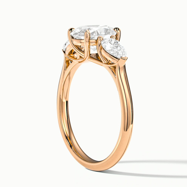 Isa 1.5 Carat Three Stone Oval Halo Moissanite Engagement Ring in 14k Rose Gold