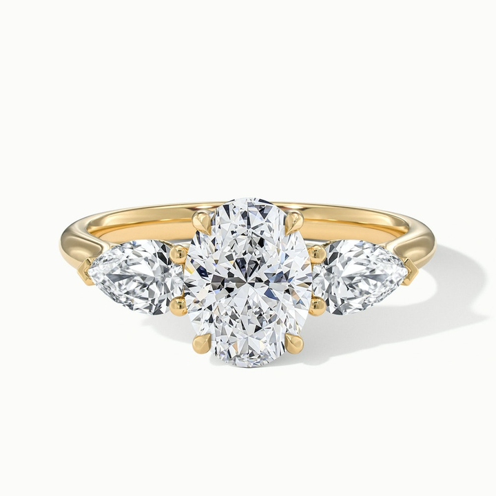 Ceci 8 Carat Three Stone Oval Halo Moissanite Engagement Ring in 18k Yellow Gold