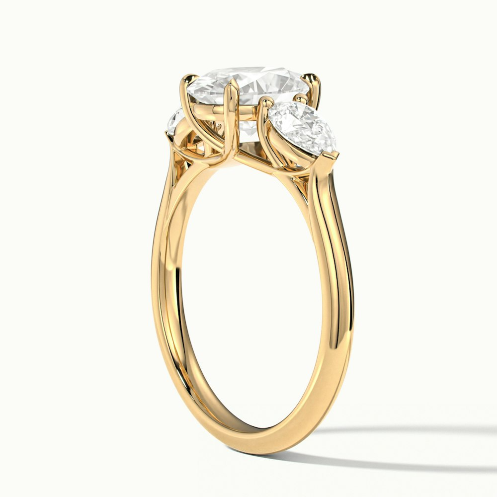 Isa 1.5 Carat Three Stone Oval Halo Moissanite Engagement Ring in 14k Yellow Gold
