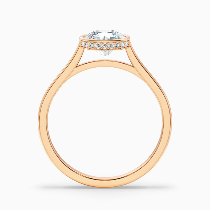 myra 9 carat round bezel set moissanite engagement ring in 14k rose gold -  Side View