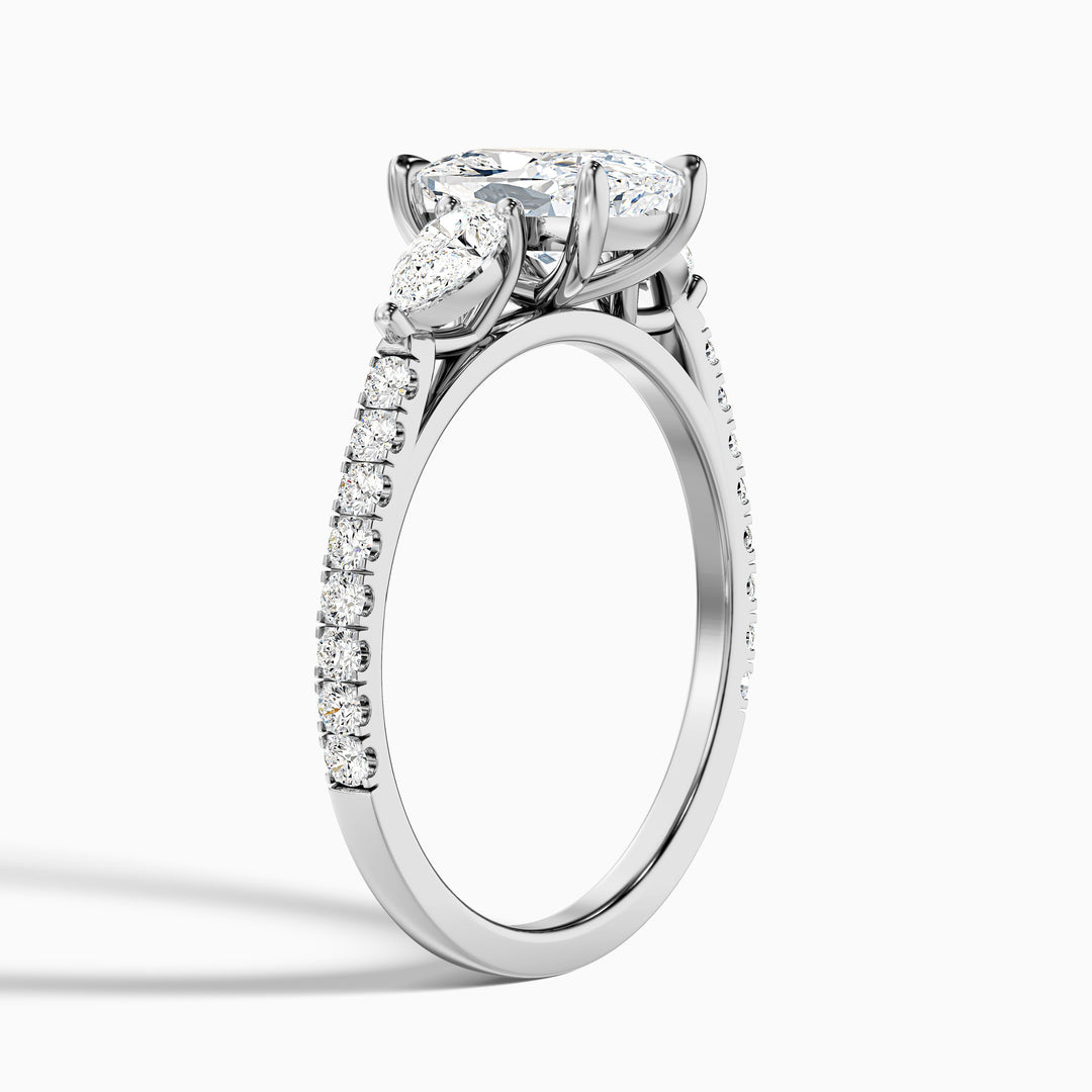 Ivana 1.5 Carat Three Stone Pave Ring with Pear Side Stones and an Elongated Cushion Lab Grown Diamond in 925 Sterling Silver