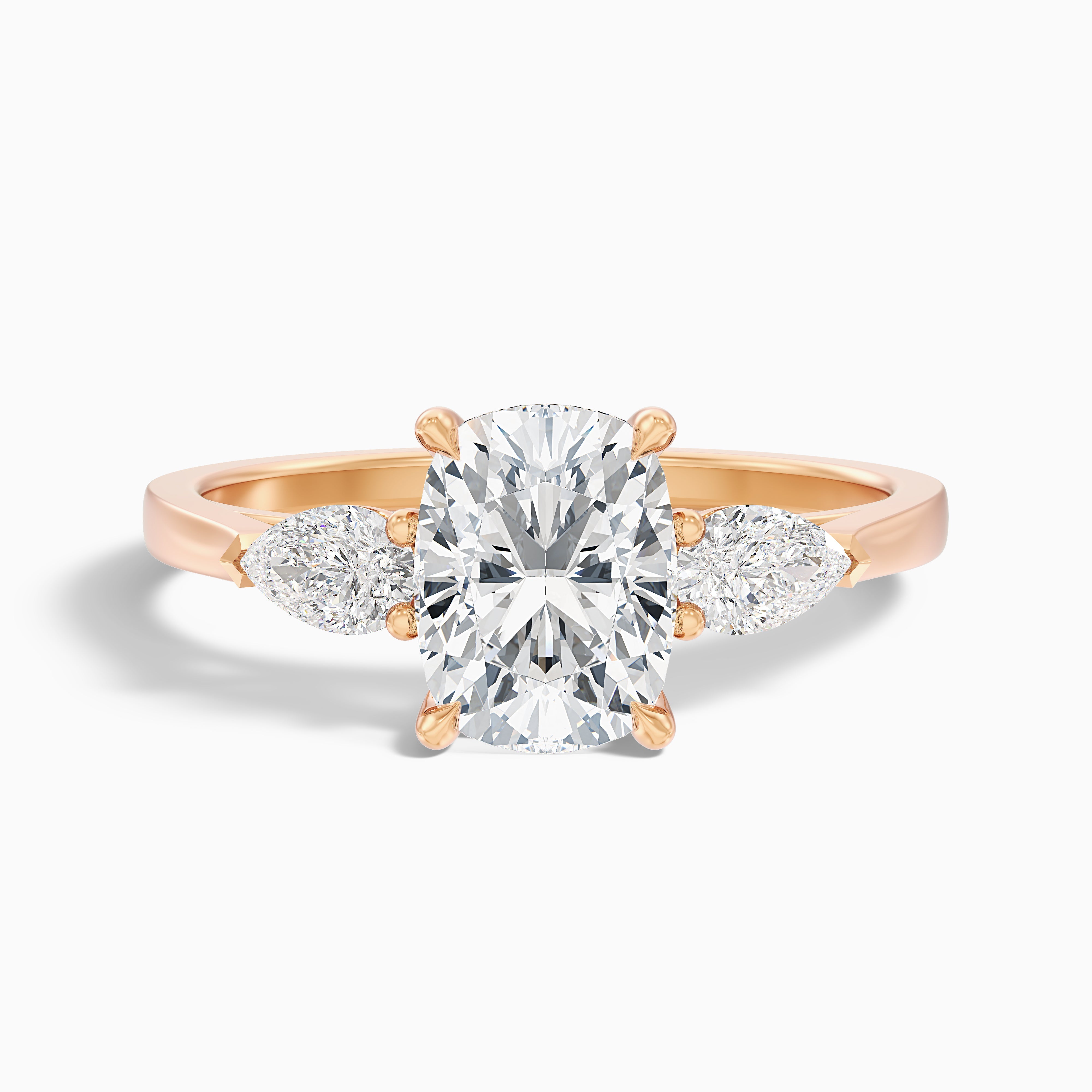 Haley 1 Carat Three Stone Ring with Pear Side Stones and an Elongated Cushion Moissanite Diamond in 10k Rose Gold