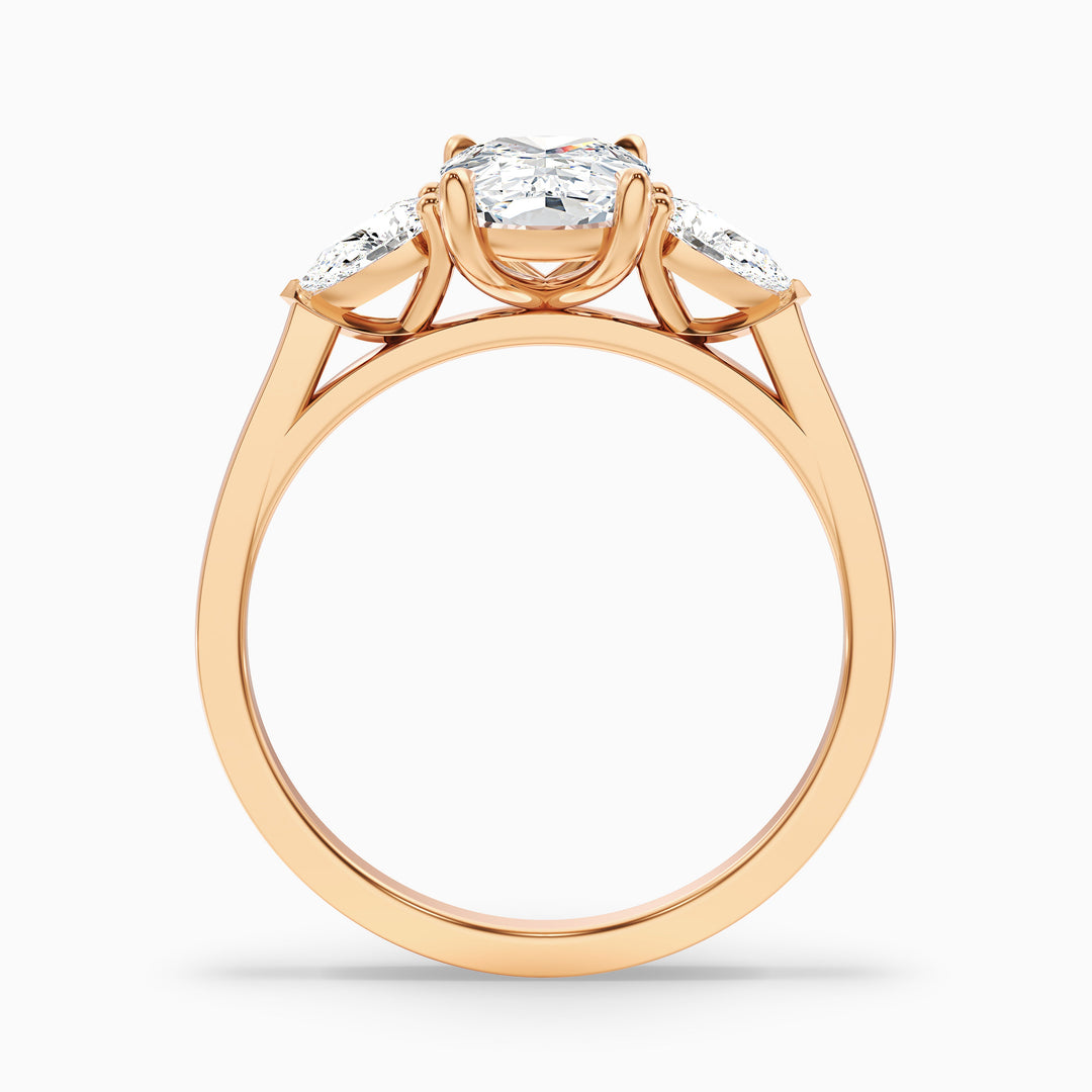 Haley 1 Carat Three Stone Ring with Pear Side Stones and an Elongated Cushion Moissanite Diamond in 10k Rose Gold