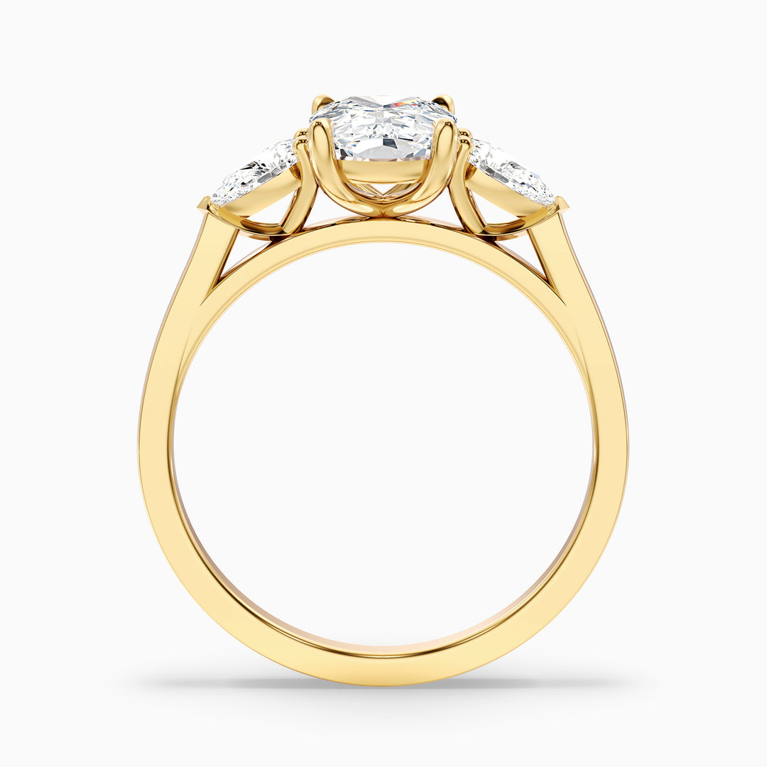 Haley 1 Carat Three Stone Ring with Pear Side Stones and an Elongated Cushion Moissanite Diamond in 10k Rose Gold