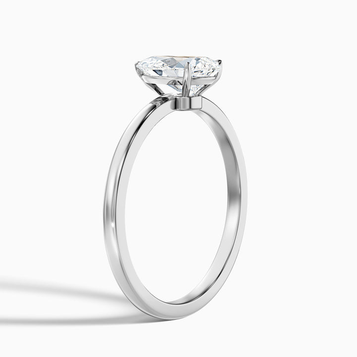 Ainsy 1 Carat Pear Cut Low Profile Solitaire Moissanite Diamond Ring in 10k Yellow Gold