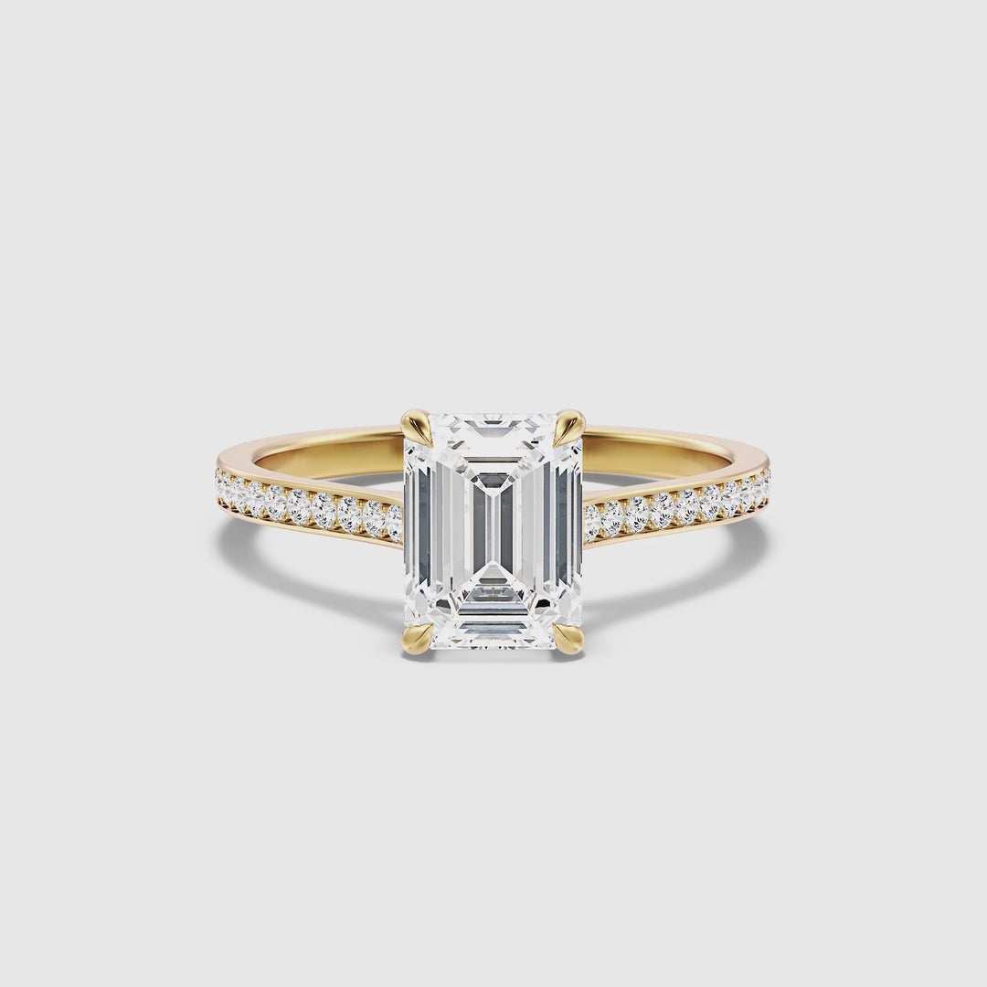 Chase 2.5 Carat Emerald Cut Side Stone Pave Moissanite Engagement Ring in 10k Yellow Gold