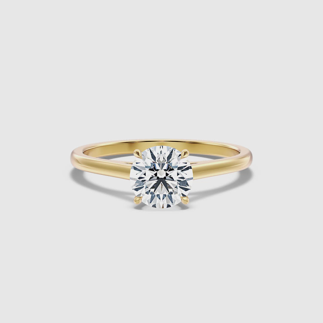 Nia 1.5 Carat Round Cut Solitaire Moissanite Engagement Ring in 10k Yellow Gold