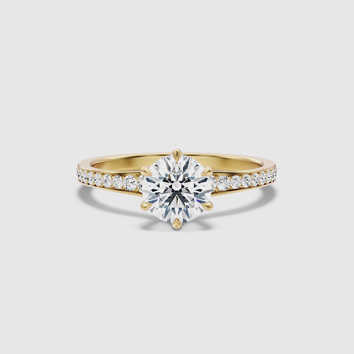 Carol 2 Carat Round Side Stone Pave Moissanite Engagement Ring in 10k Yellow Gold