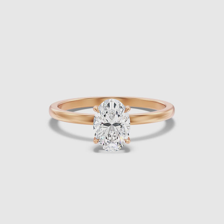 Hailey 1.5 Carat Oval Cut Solitaire Lab Grown Engagement Ring in 14k Rose Gold